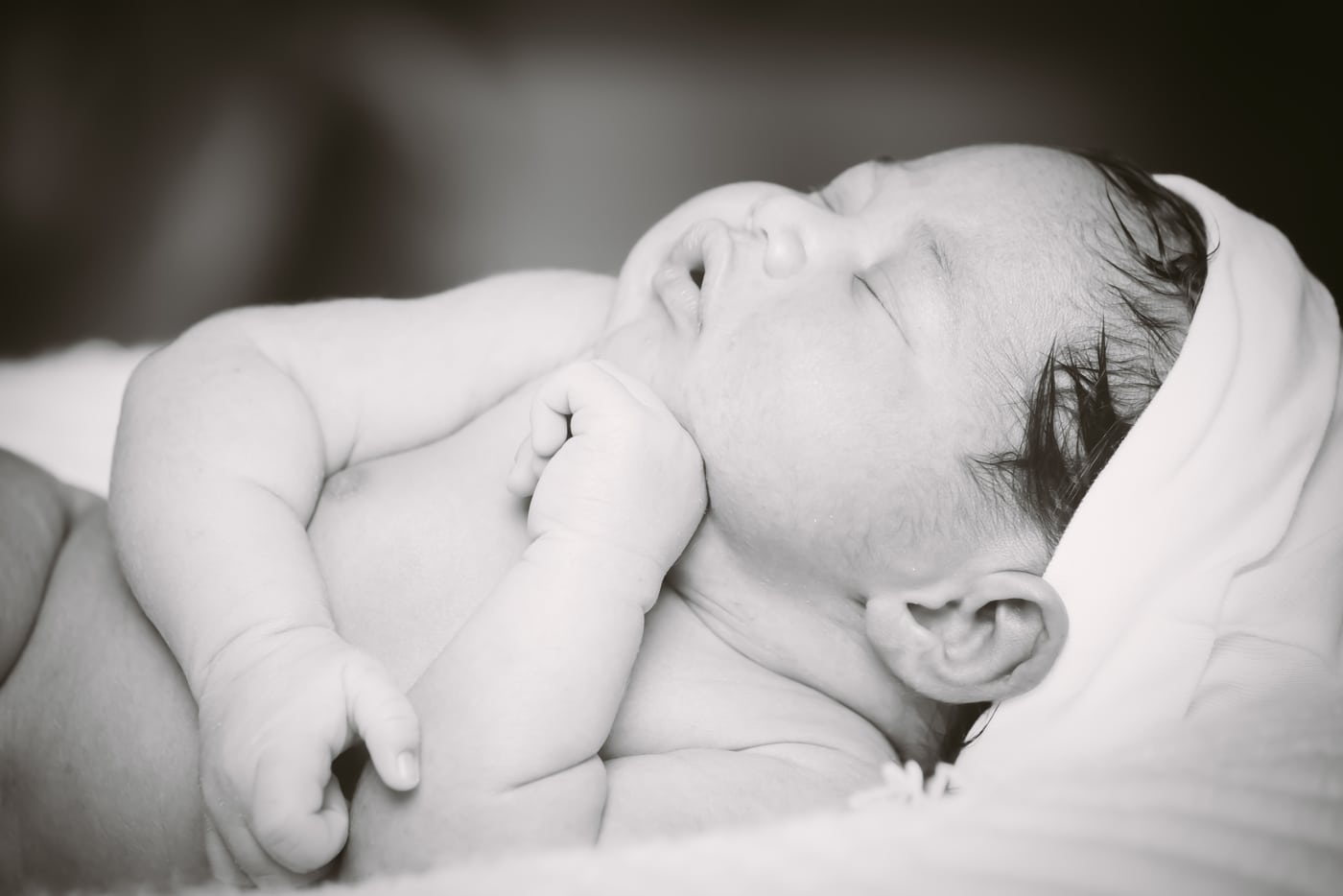 Sleeping newborn, B&W, tender.