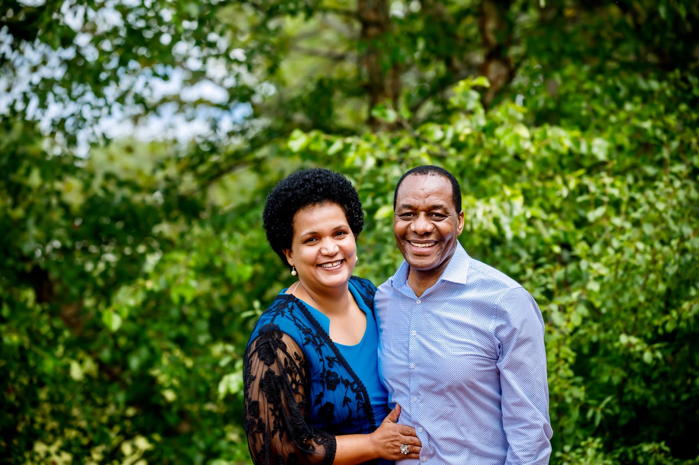 Couple in greenery, warm, couple.