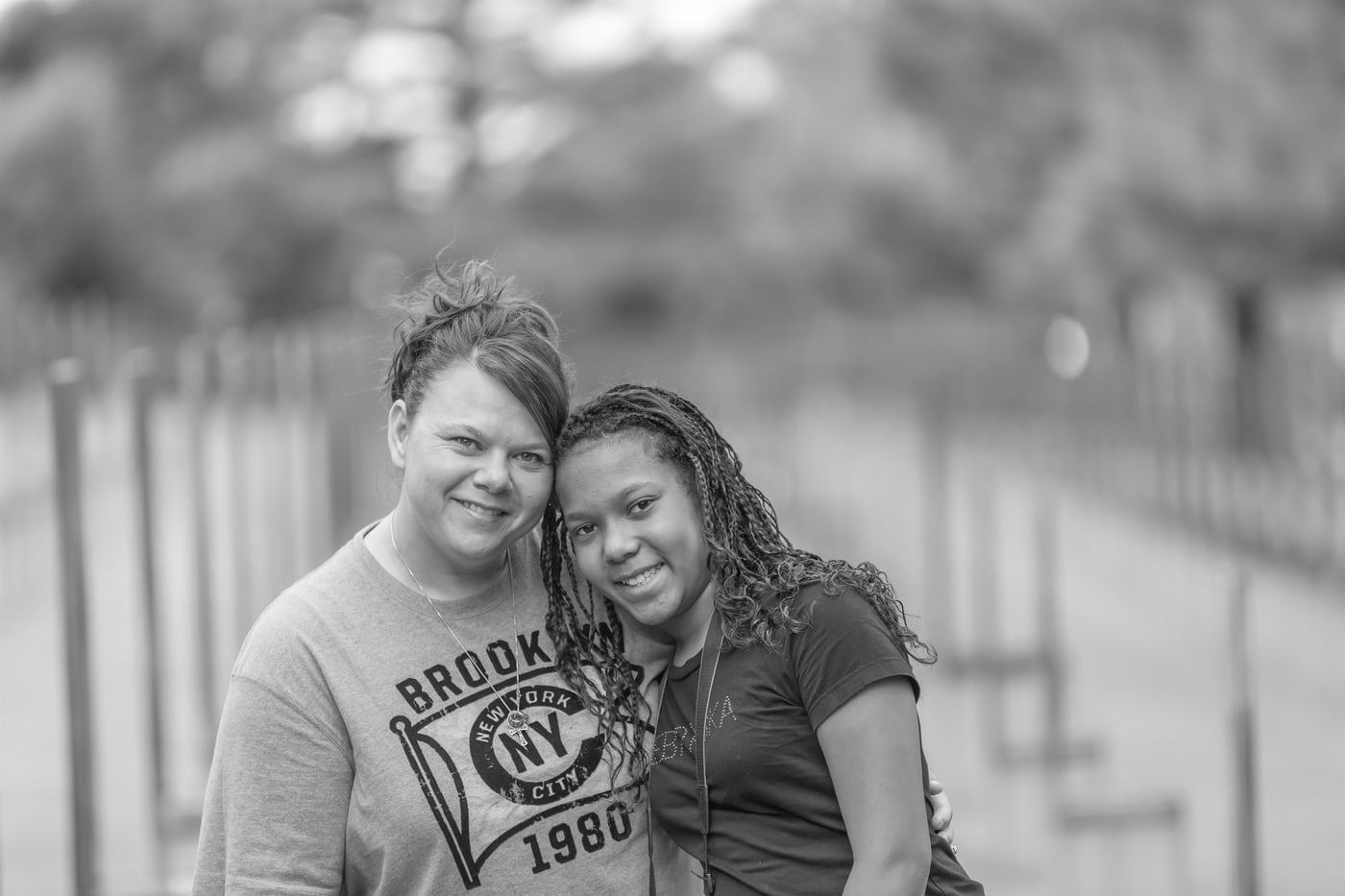 Black-and-white family connection portrait.
