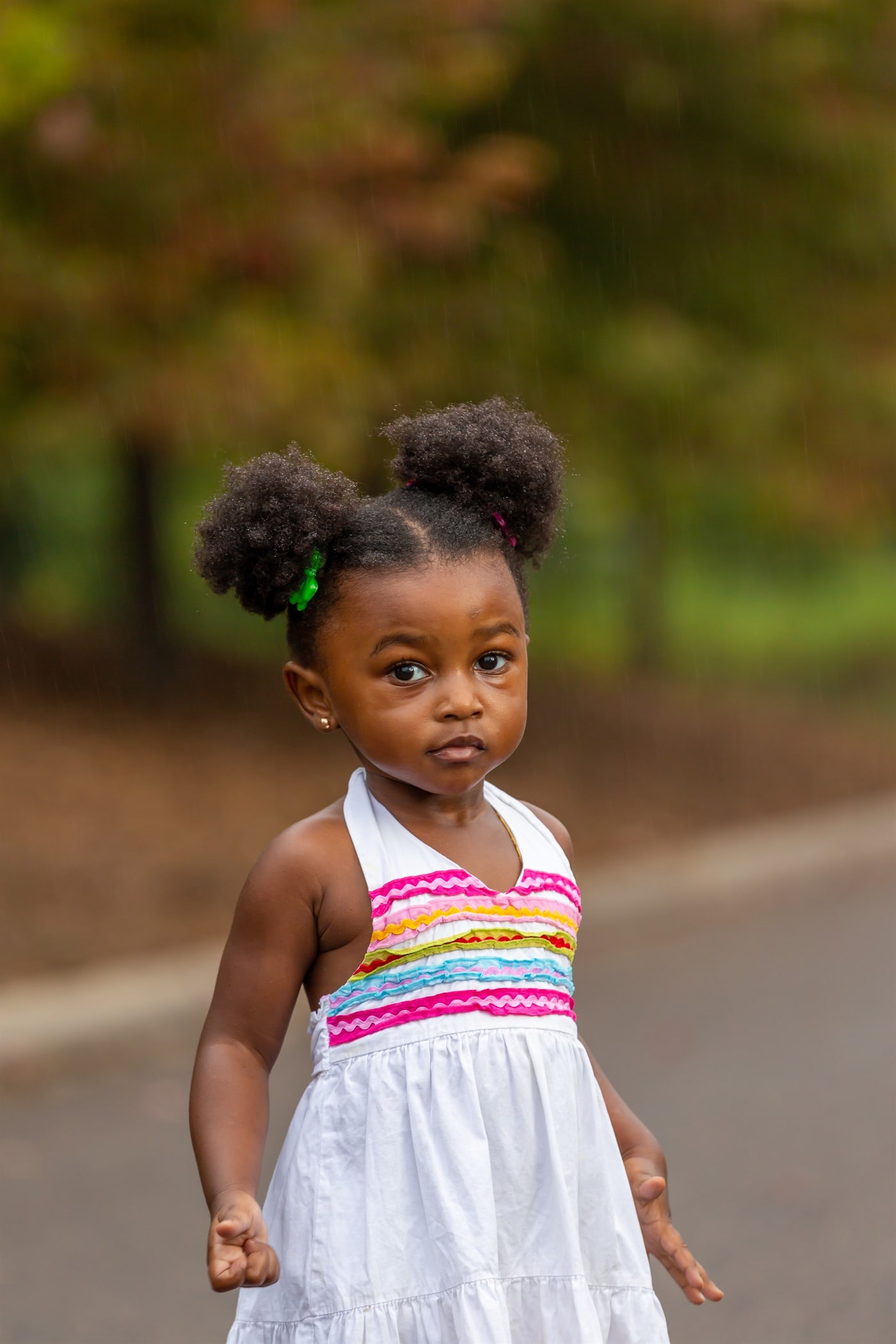 Outdoor child portrait with soft background.