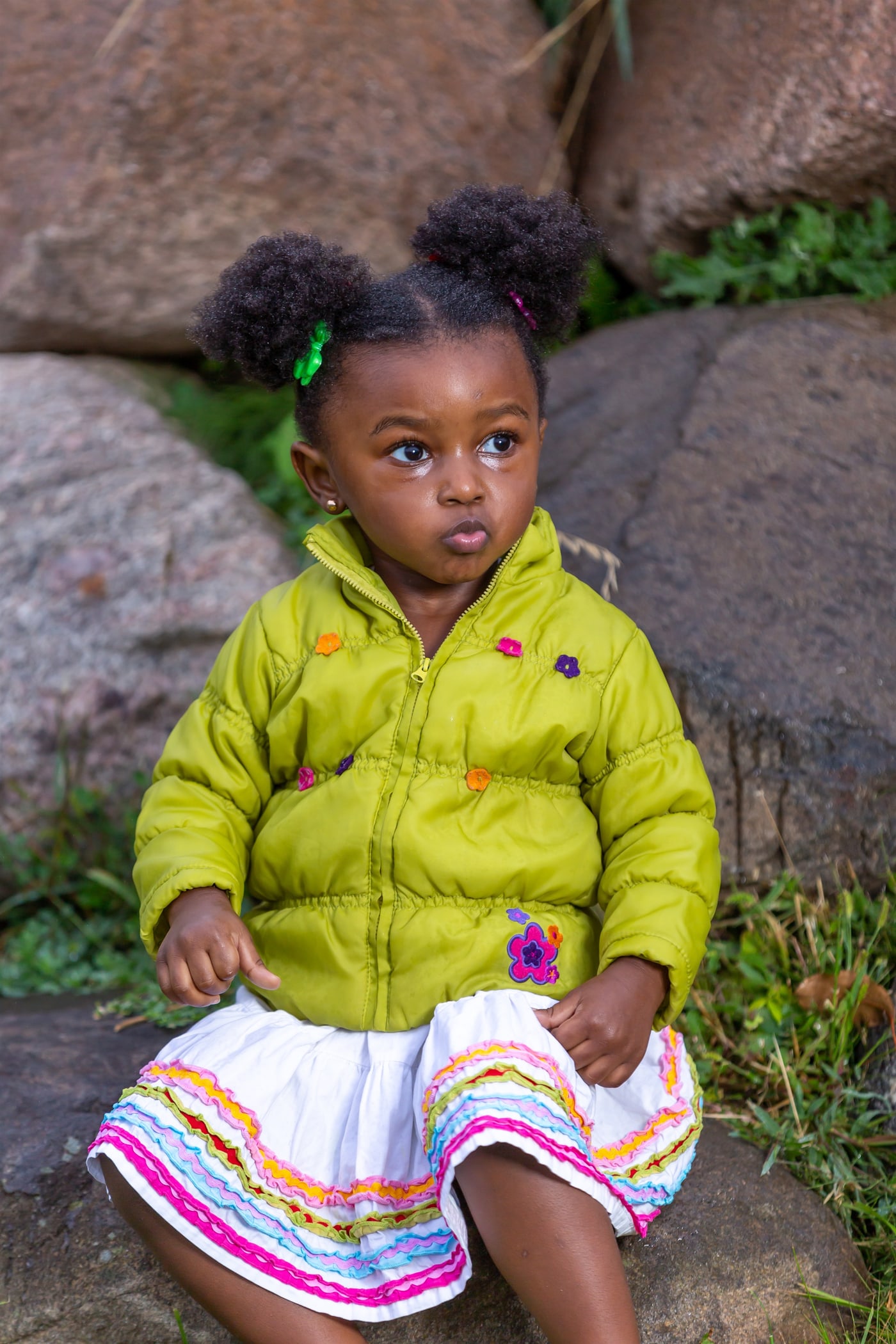 Toddler portrait with expressive face and color.