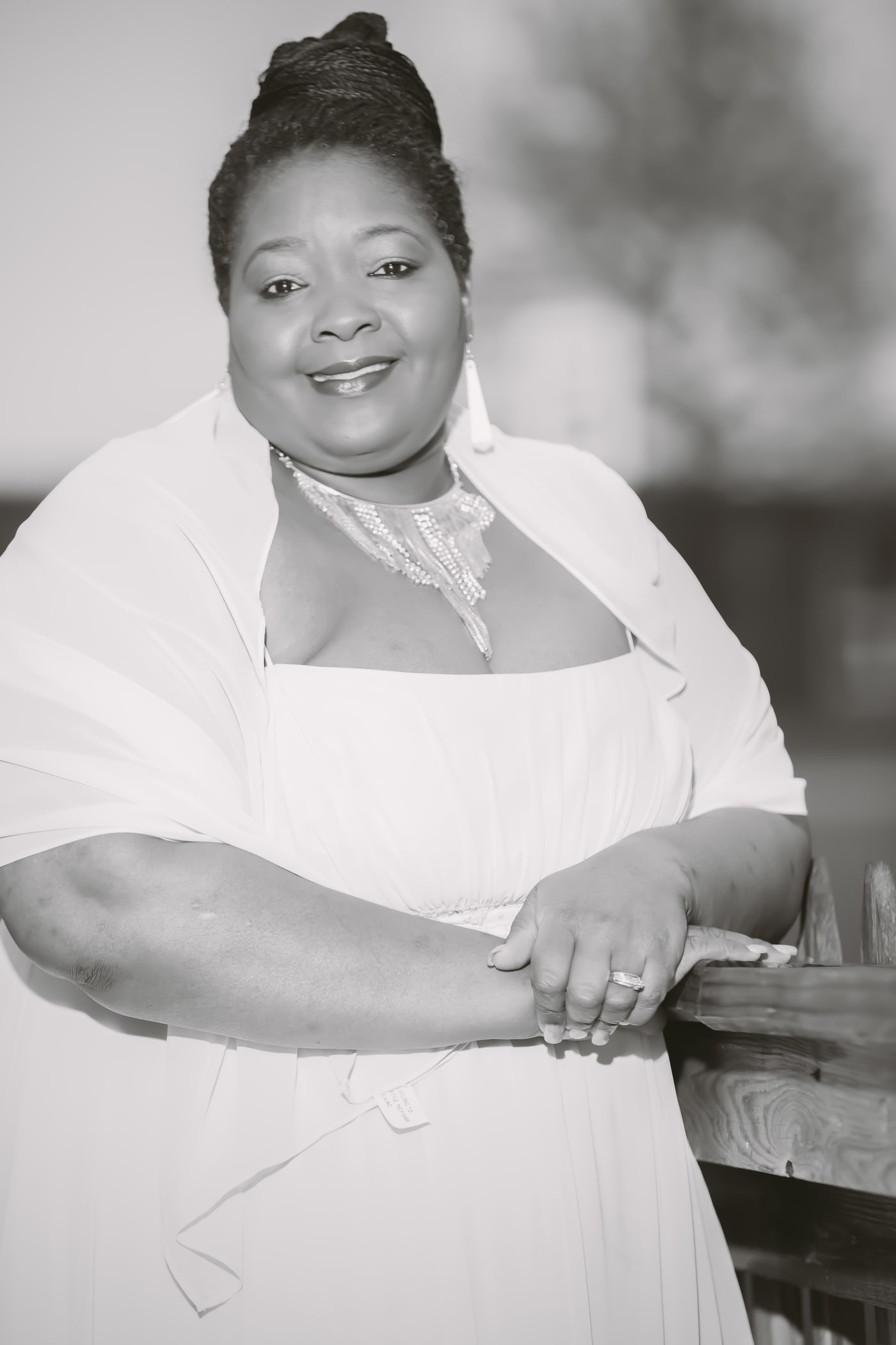 Small-business owner portrait in black and white.