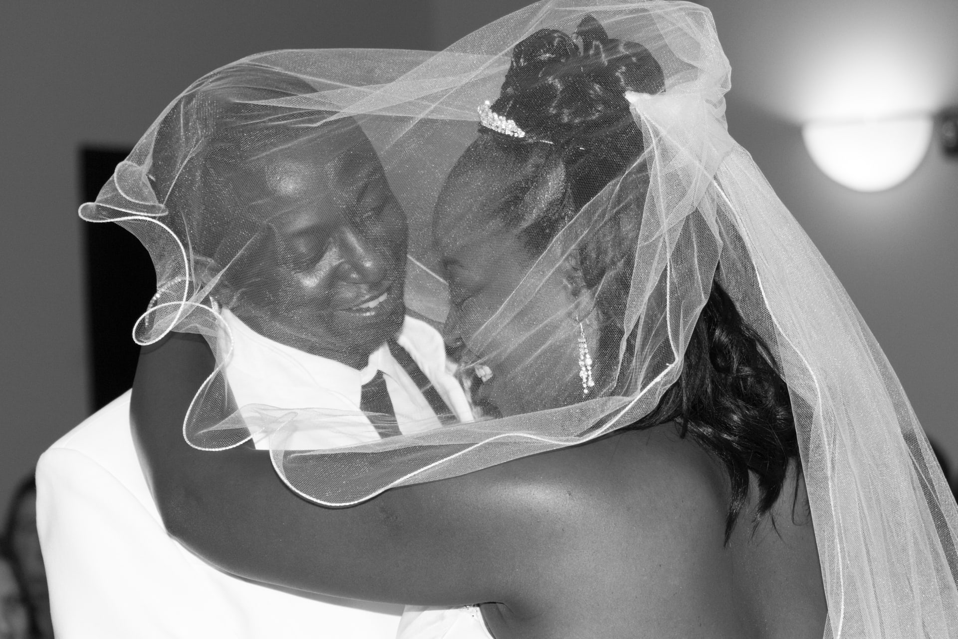 Black and white bride veil portrait. Photograph by Samuel Mfinanga for Mfinanga Photography + Motion.