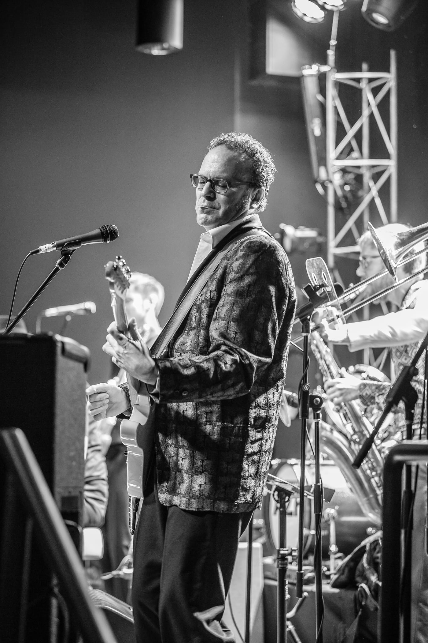 Live band on stage, B&W.