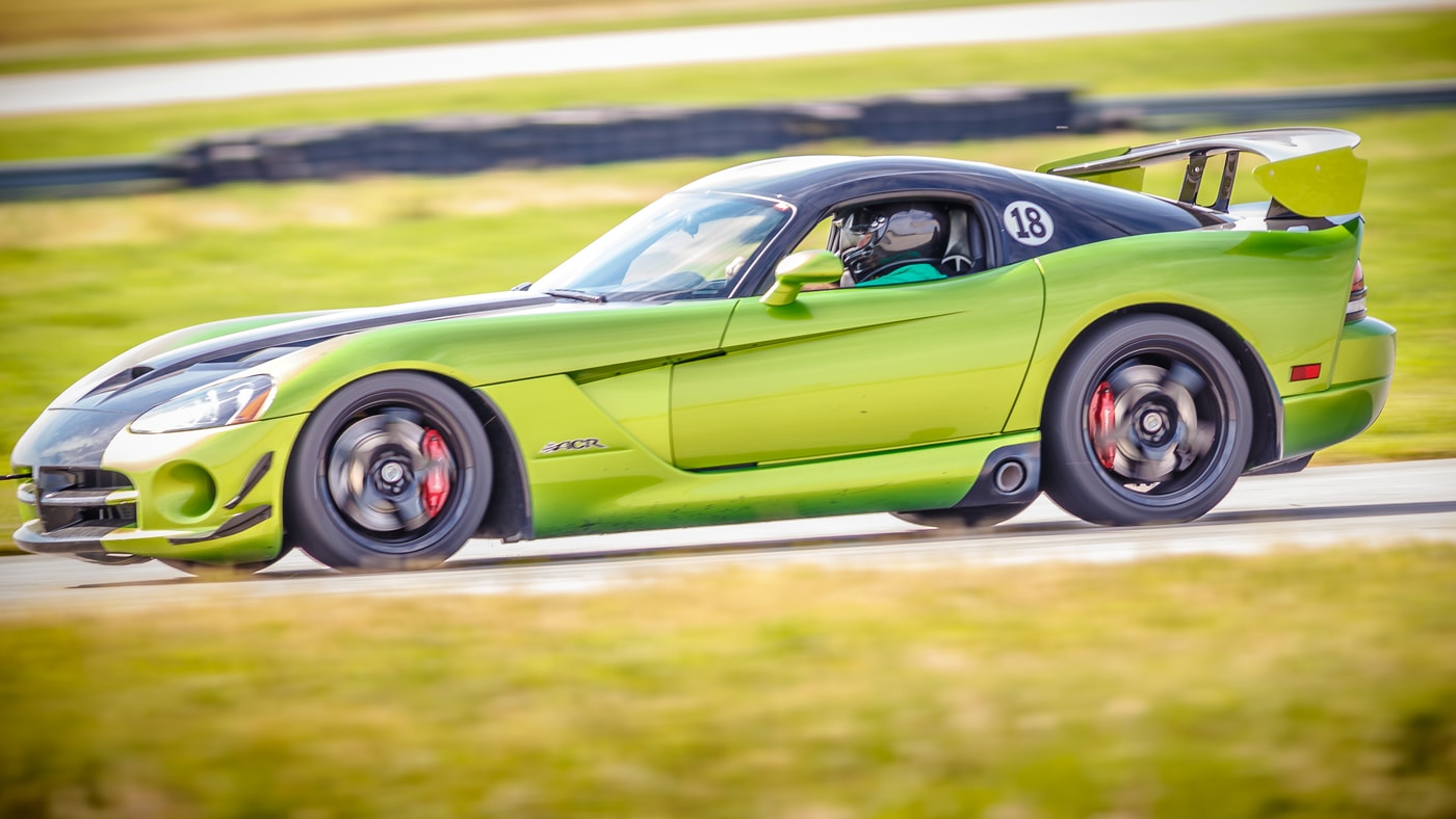 Race car speed pan, motion video energy.
