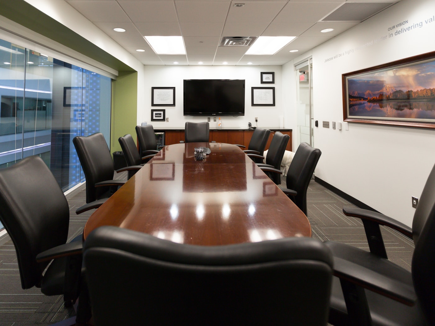 Corporate boardroom motion still.