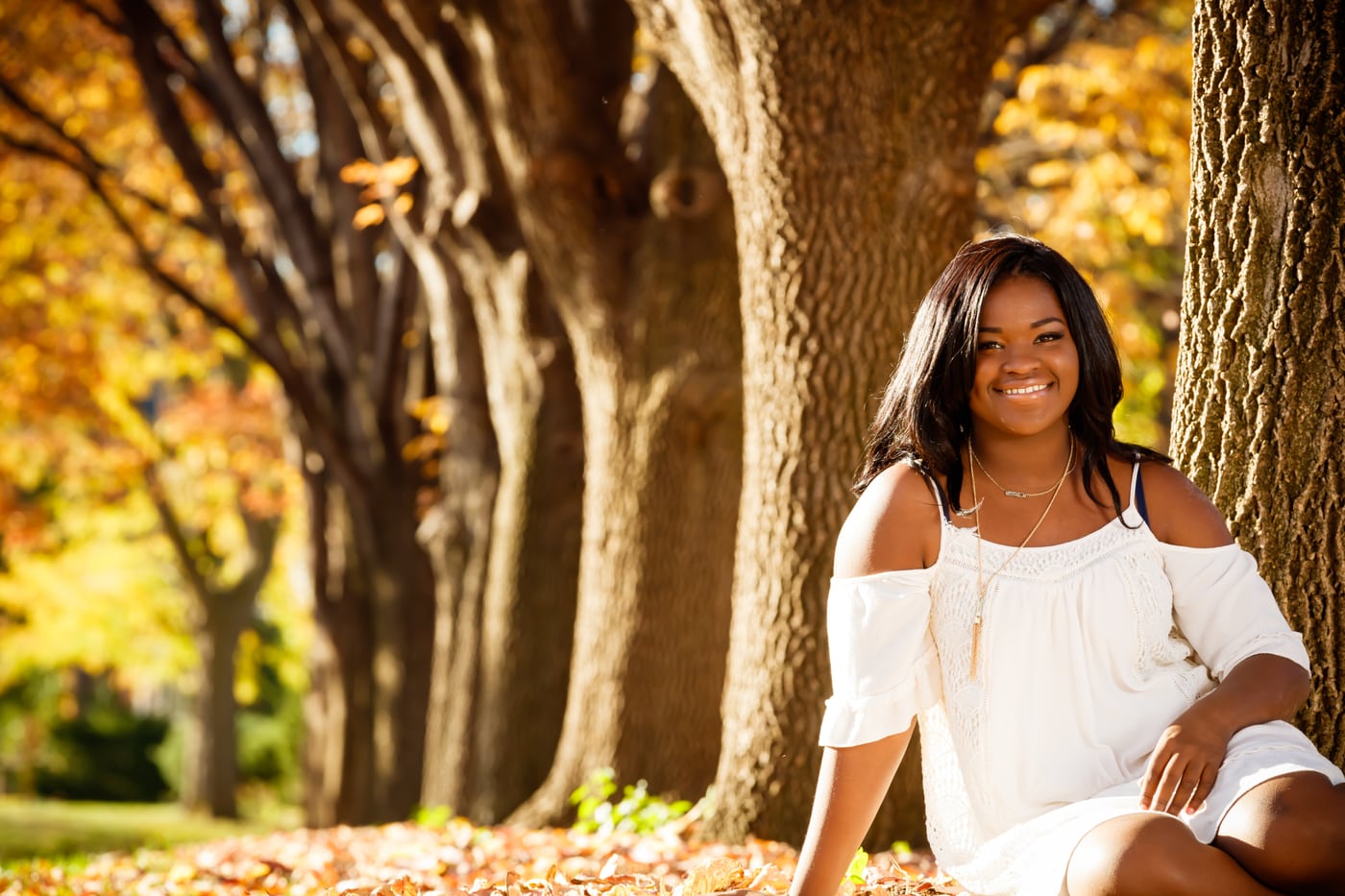Woman white dress, autumn trees.