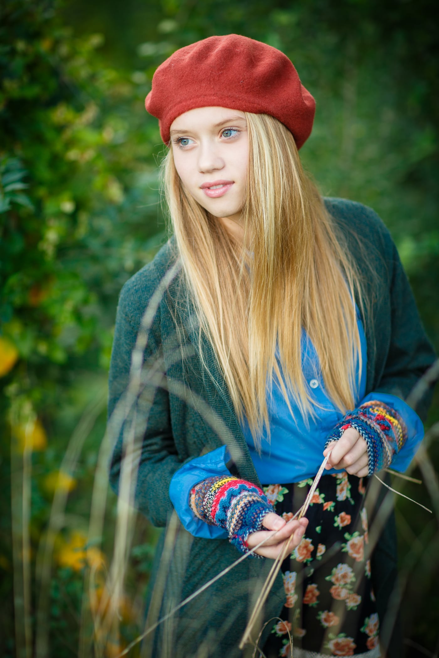 Senior girl red beret, greenery, autumn, editorial.