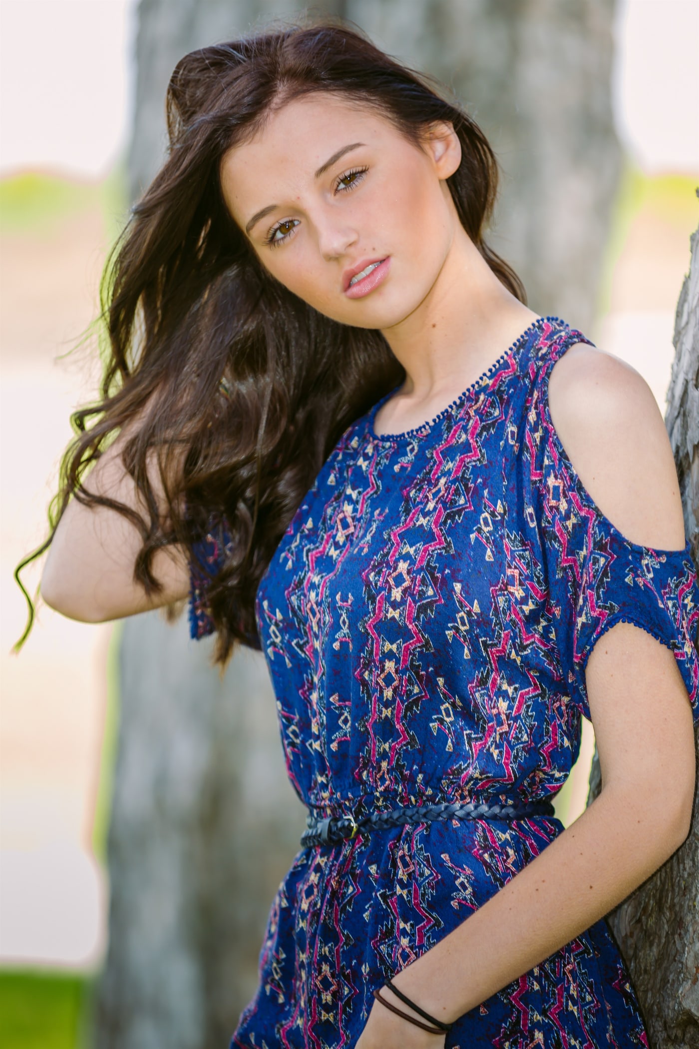 Outdoor senior portrait in blue dress.