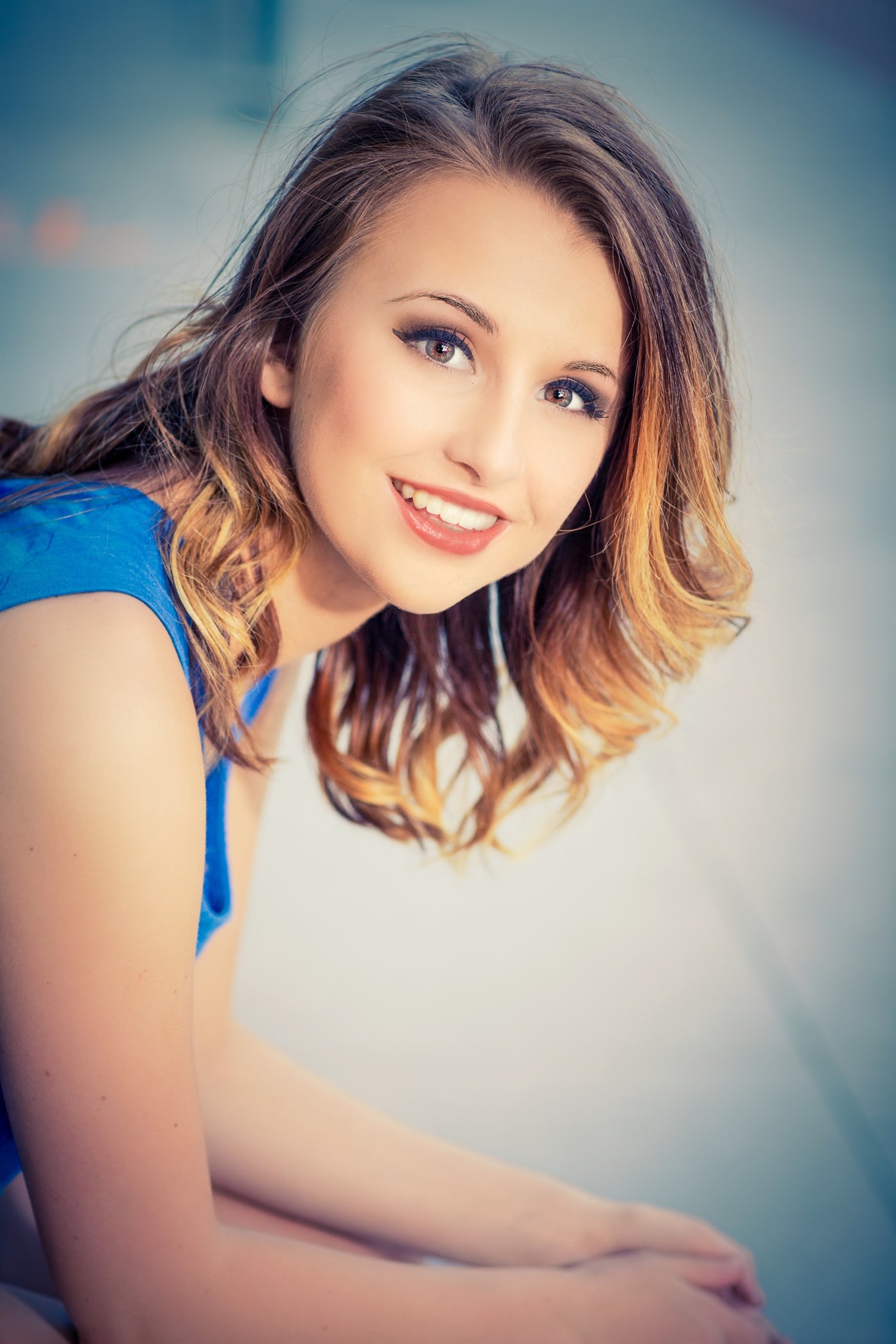 Soft senior portrait with blue dress.