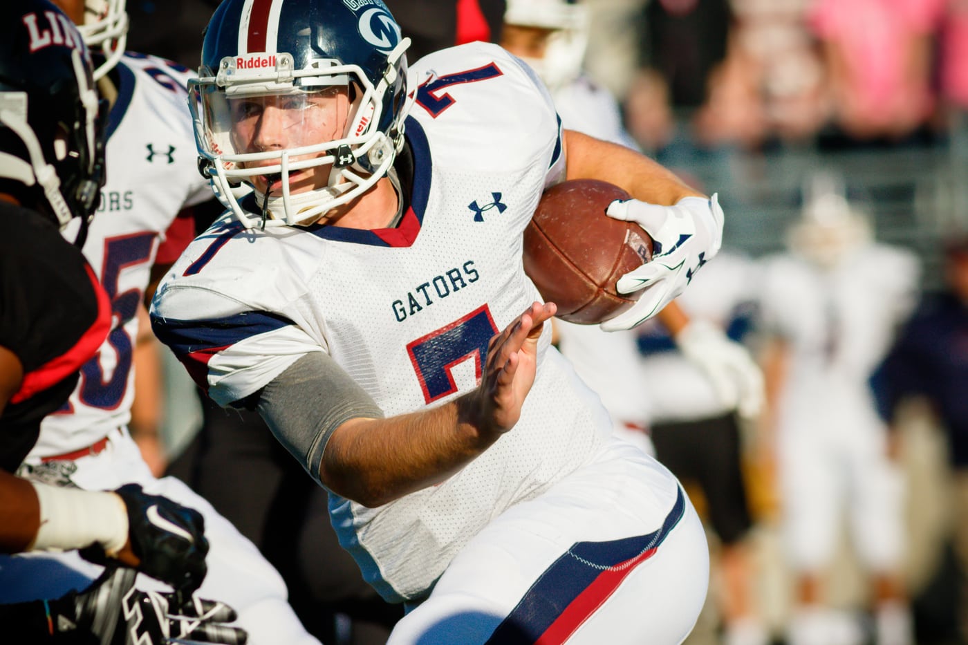 Football Gators #7 running, action.