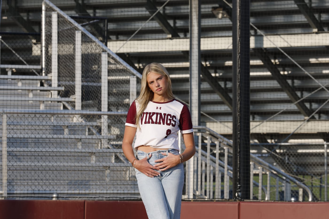 Softball Vikings girl, dugout.