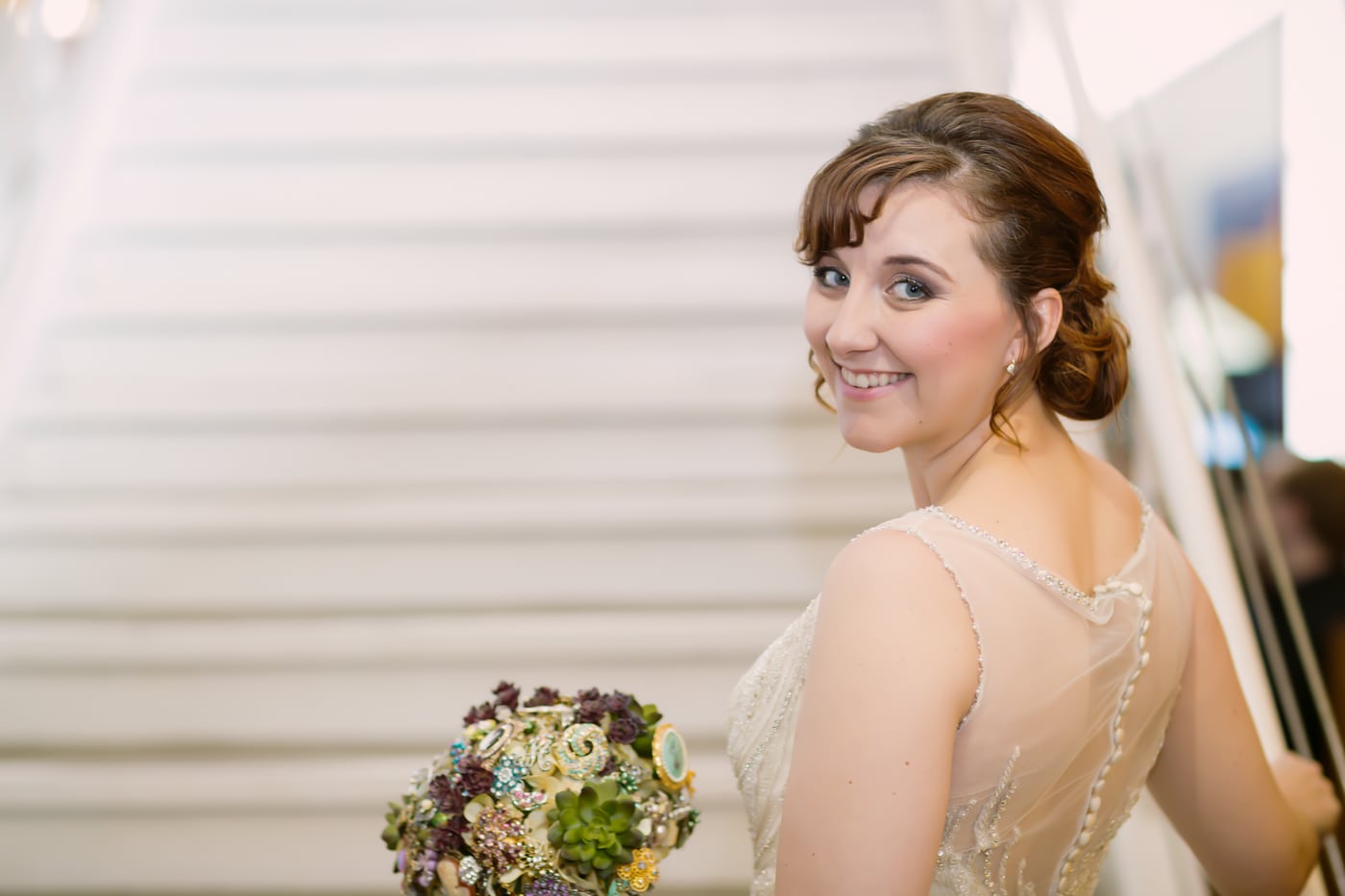 Bride with bouquet, over-shoulder, vintage.