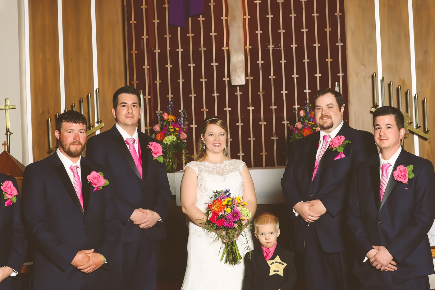 Wedding party at ceremony.