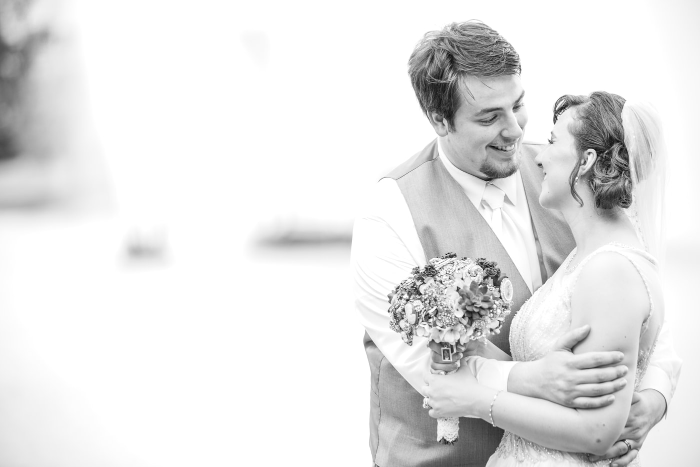 Wedding couple high key black and white portrait.