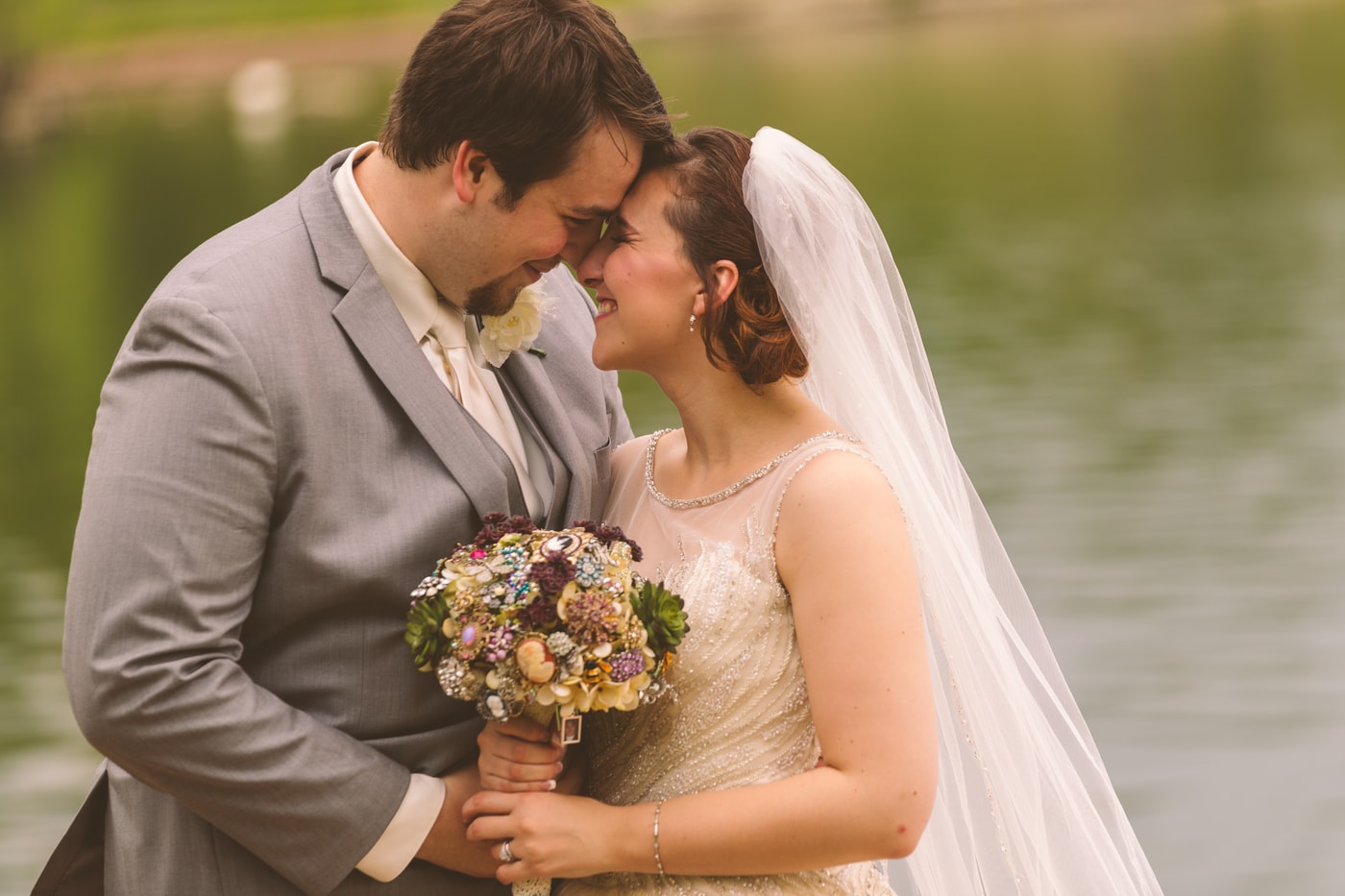 Wedding couple lakeside portrait.