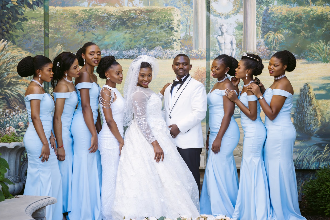 Wedding couple and bridal party joy.