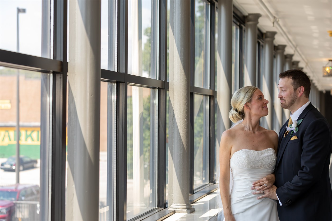 Bride and groom walking portrait.