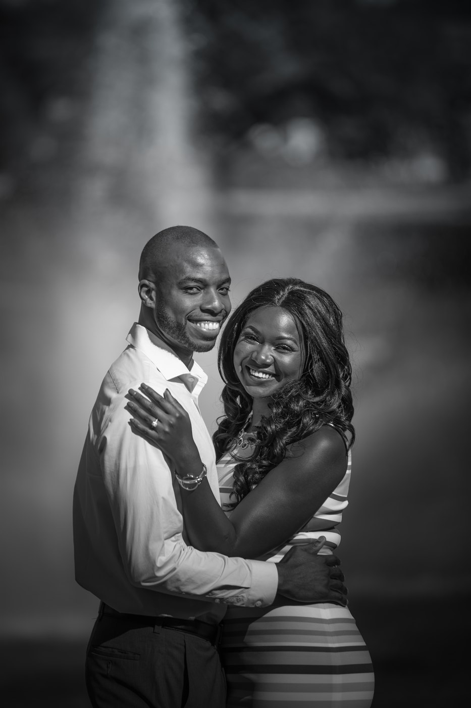Bride and groom seated portrait.