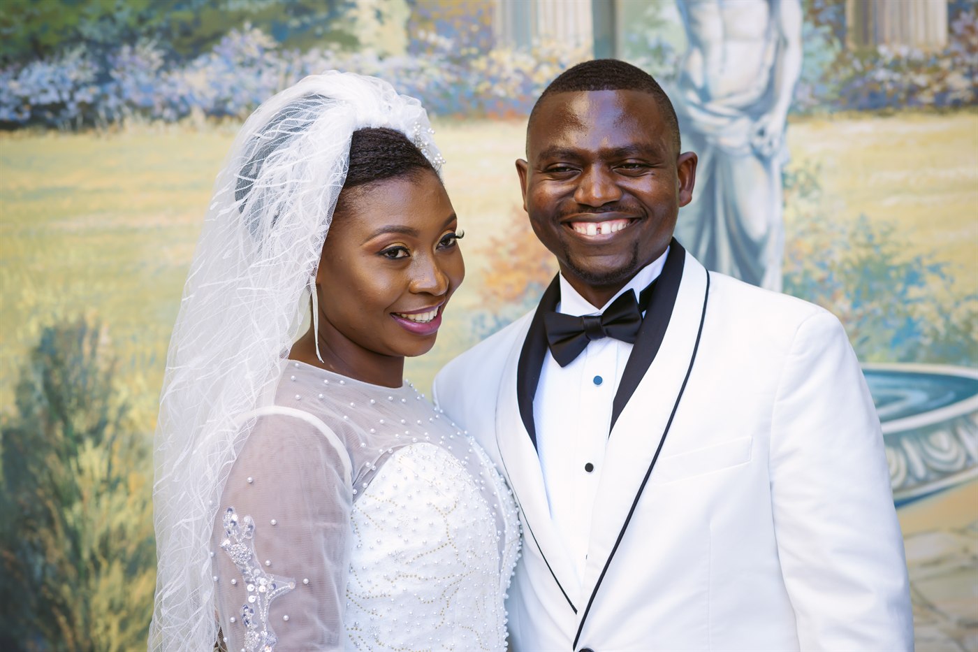Bride and groom wedding party portrait.