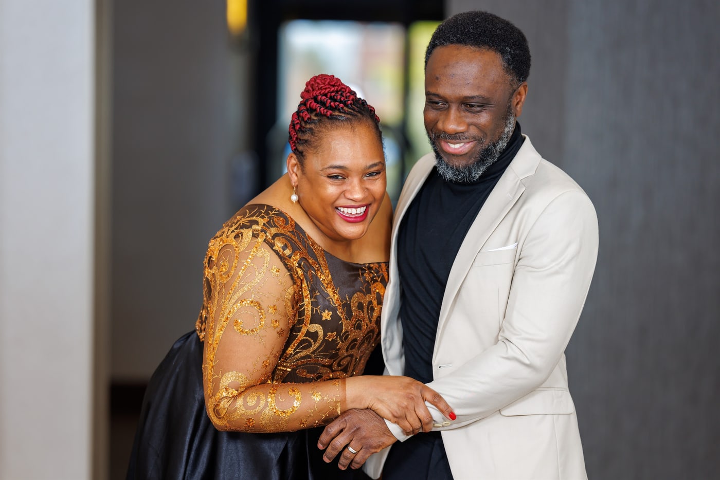 Joyful formal couple portrait.