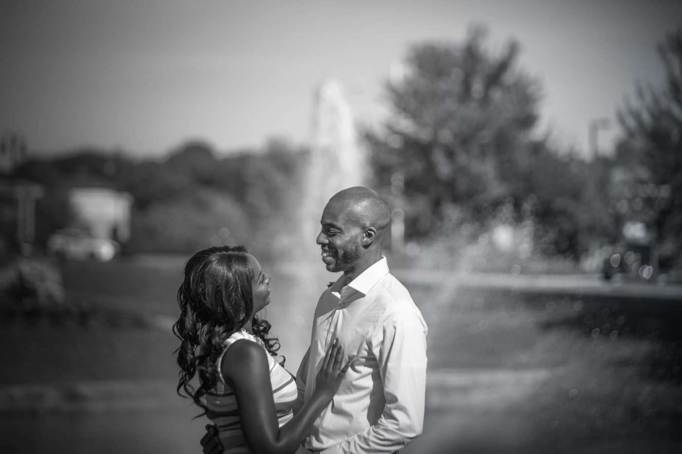 Black-and-white wedding couple portrait with quiet intimacy.